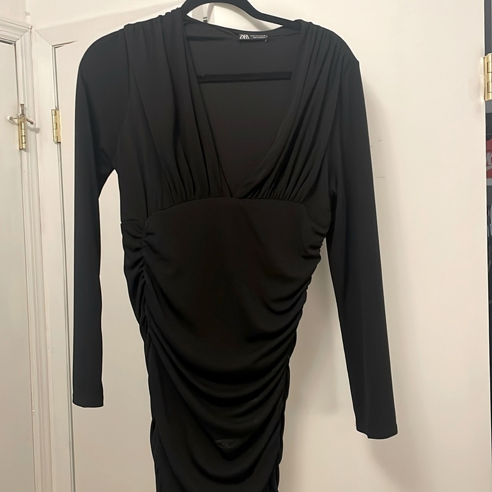 Black dress with chest slit, ruffled